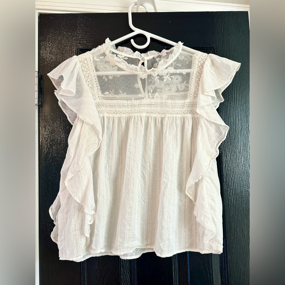 Olivaceous top. Size Medium. White. Excellent condition!